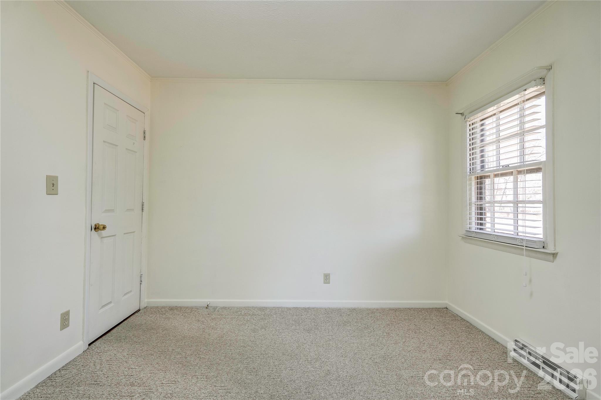 431 North Main Street Shelby, NC 28152 - Photo 22 of 37 an empty room with a window