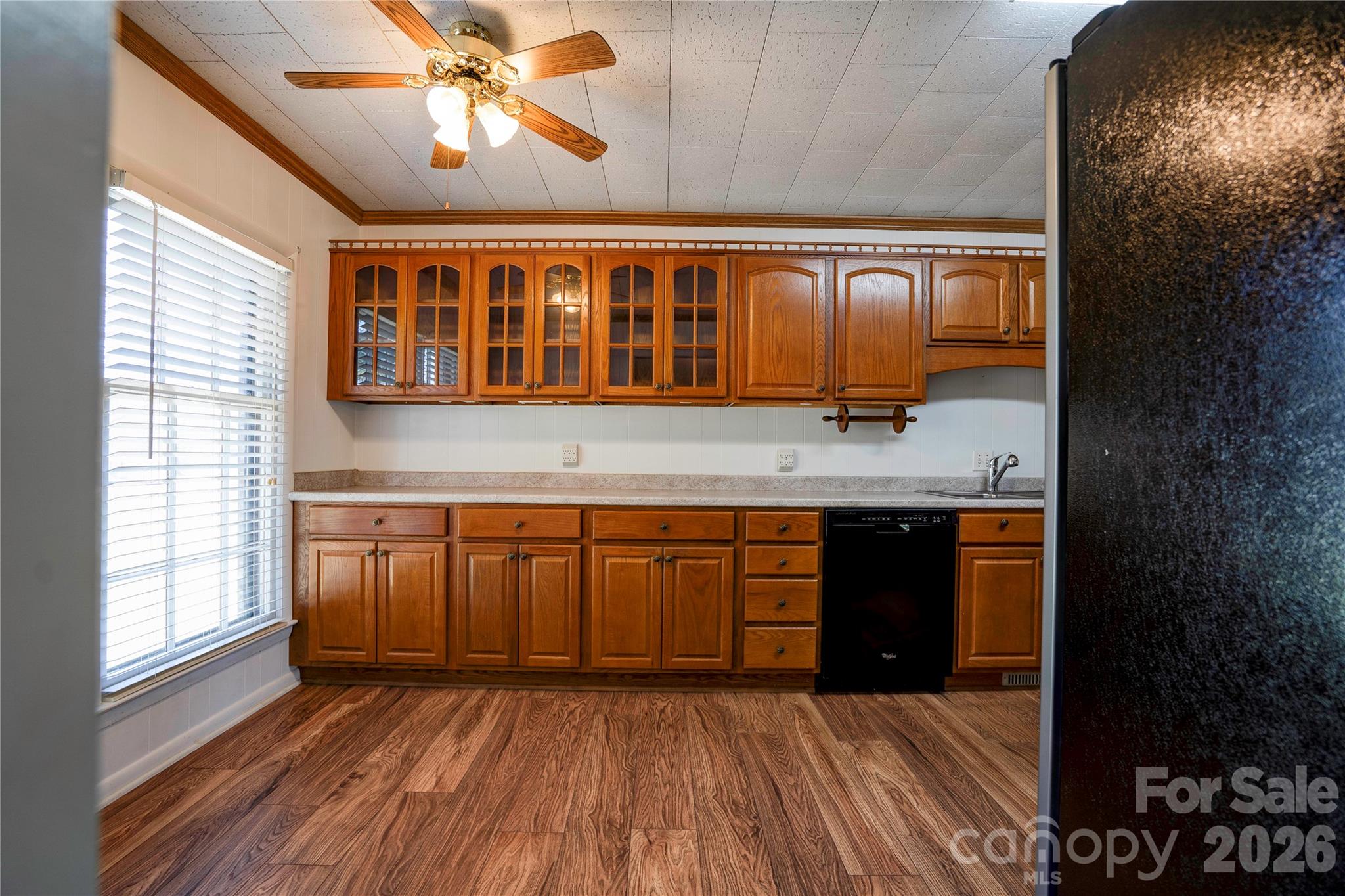 431 North Main Street Shelby, NC 28152 - Photo 9 of 37 a view of a kitchen with a sink and wooden floor