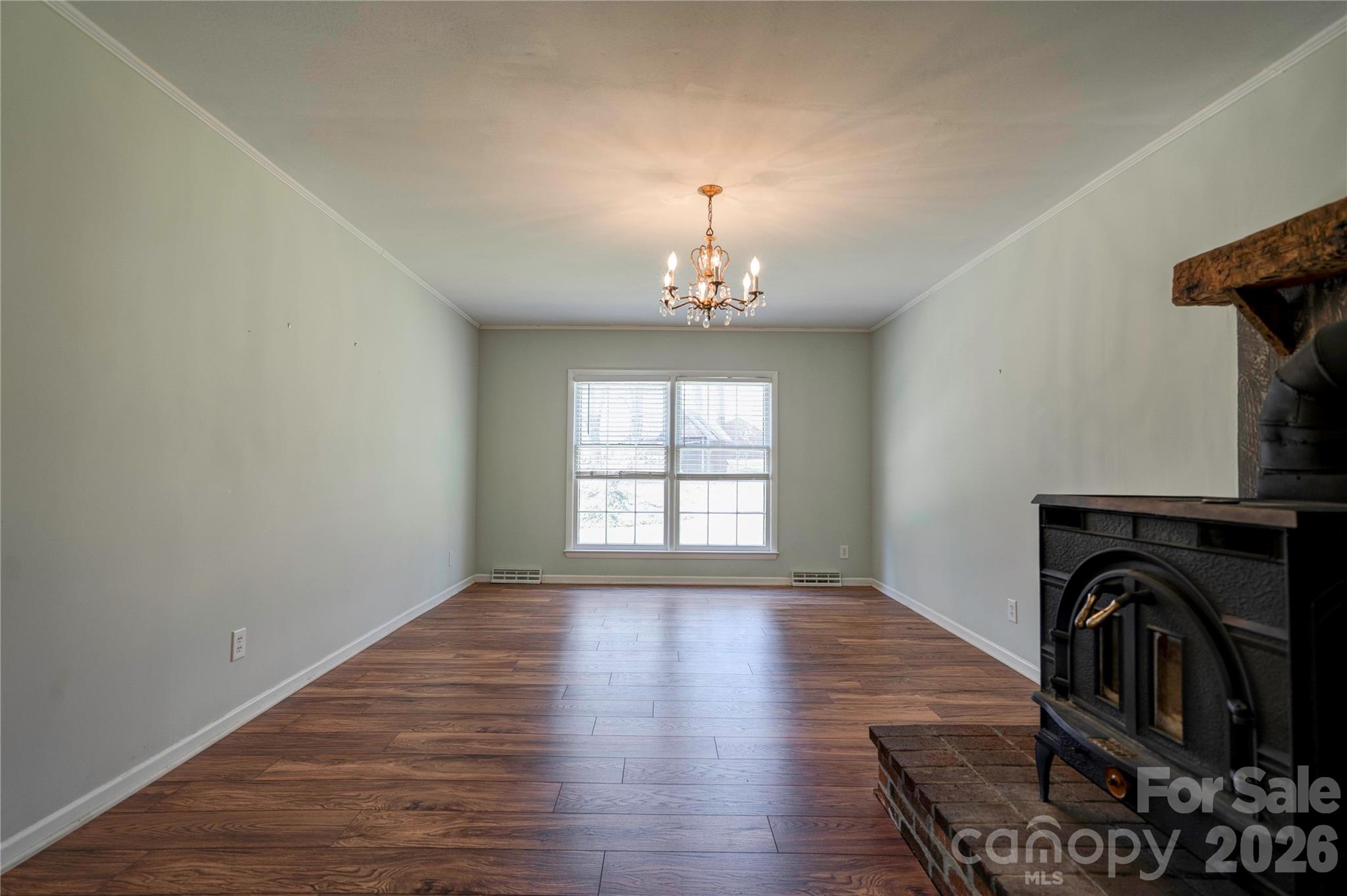 431 North Main Street Shelby, NC 28152 - Photo 10 of 37 a view of empty room with window and wooden floor