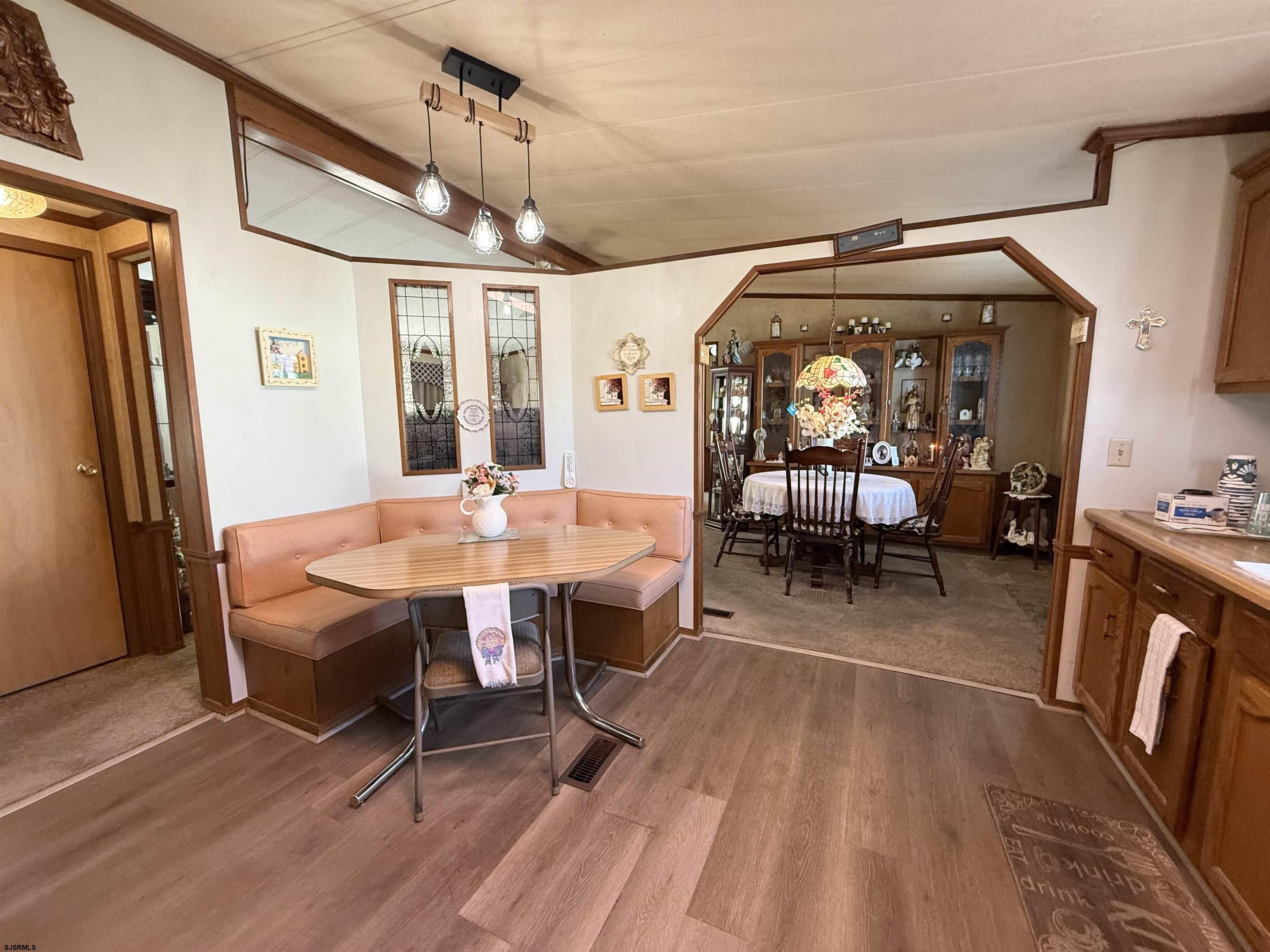 443 Priscilla Lane Buena, NJ 08310 - Photo 16 of 37 a view of a dining room with furniture and chandelier