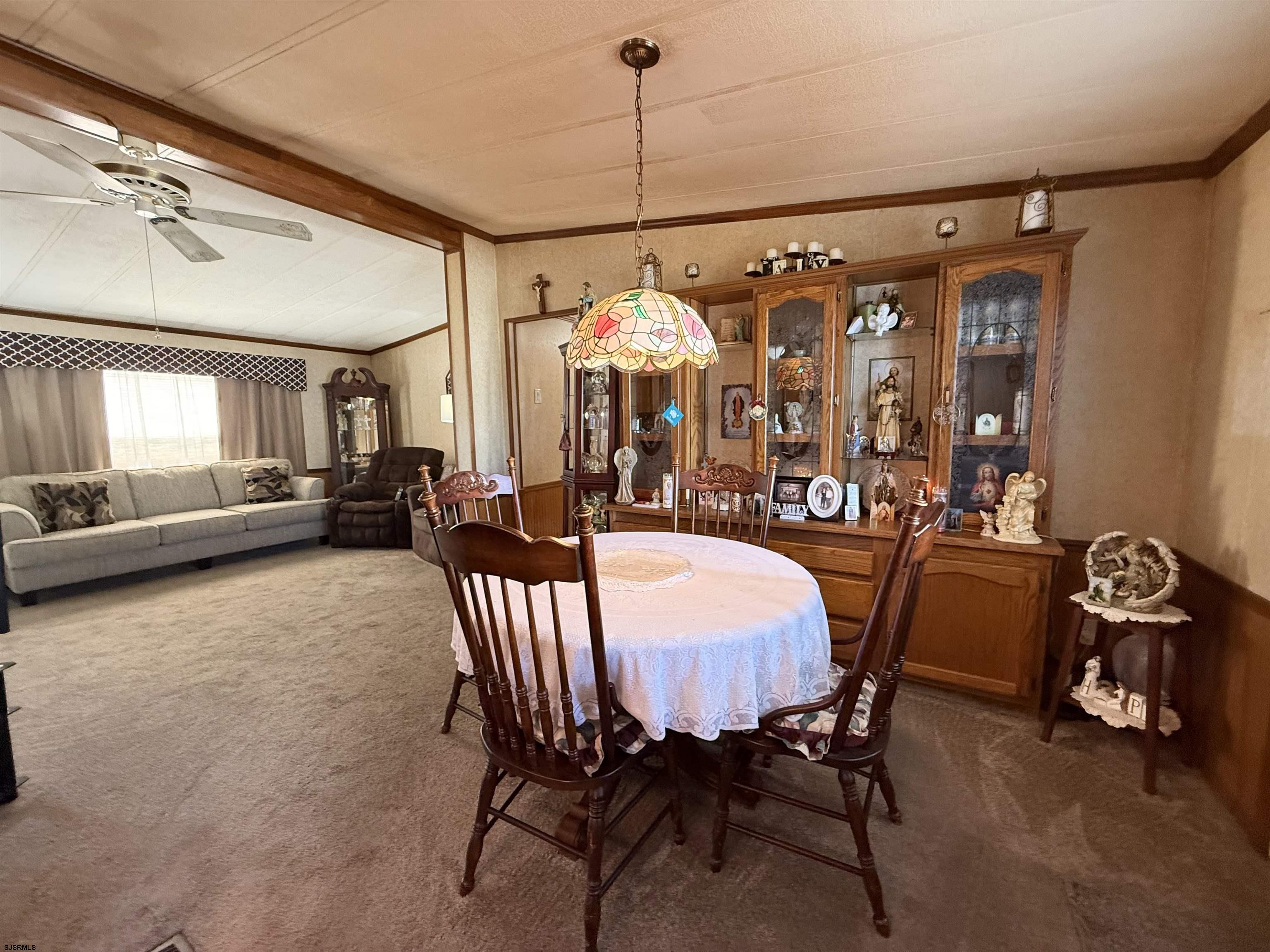 443 Priscilla Lane Buena, NJ 08310 - Photo 18 of 37 a view of a dining room with furniture and window