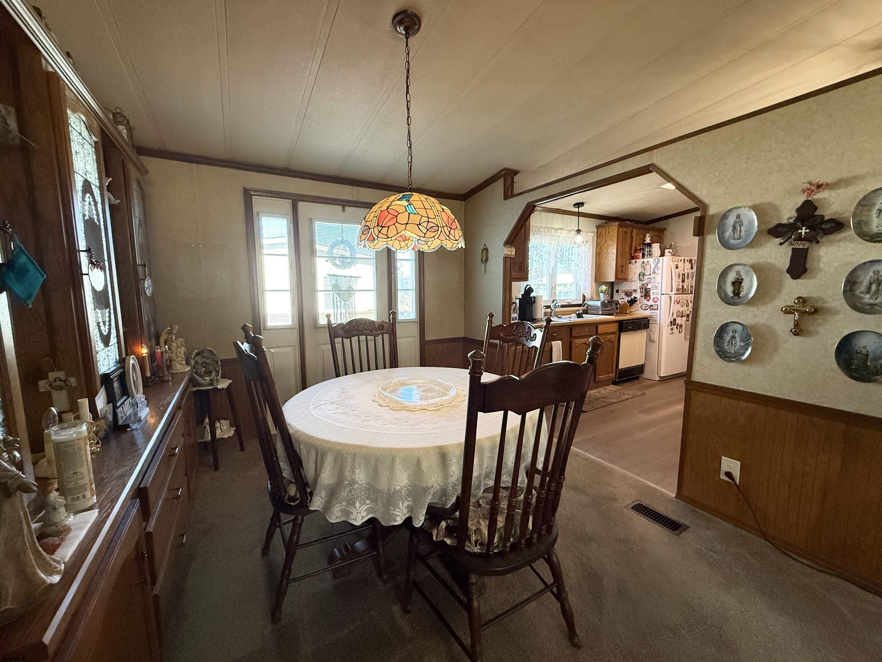 443 Priscilla Lane Buena, NJ 08310 - Photo 20 of 37 a view of a dining room with furniture window and outside view