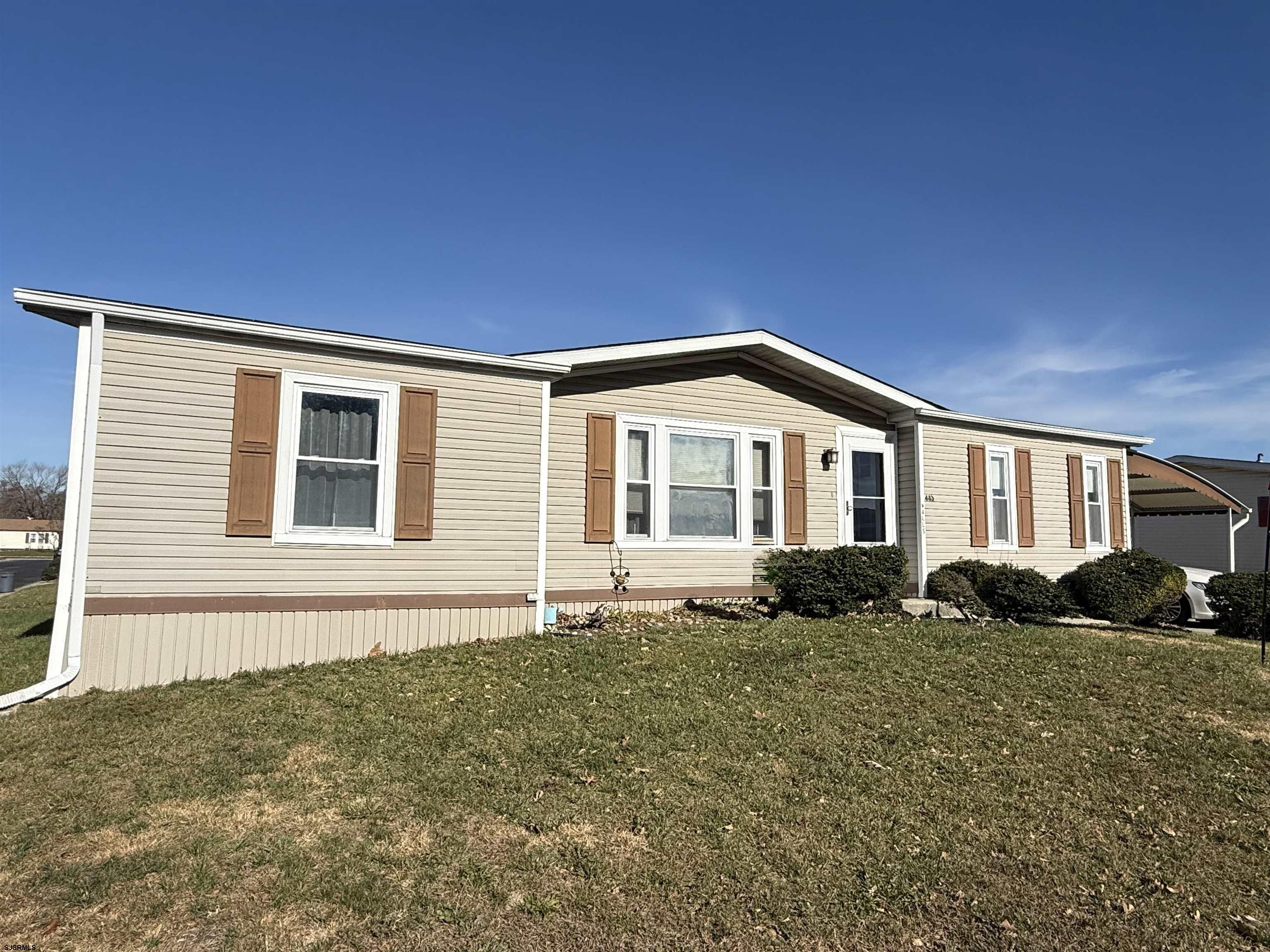 443 Priscilla Lane Buena, NJ 08310 - Photo 2 of 37 a front view of a house with a yard