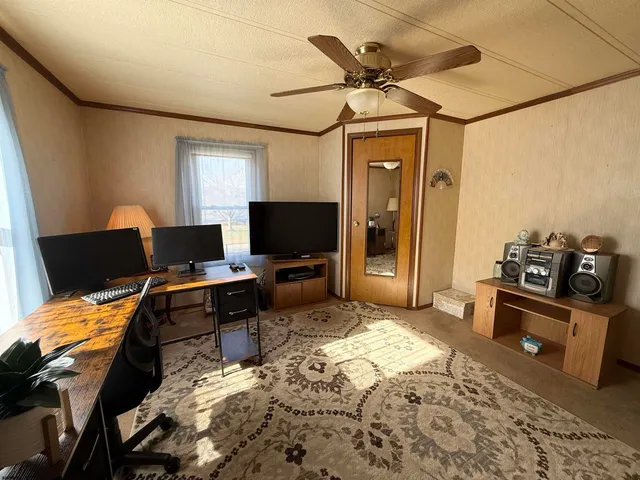 a bedroom with furniture and a bed