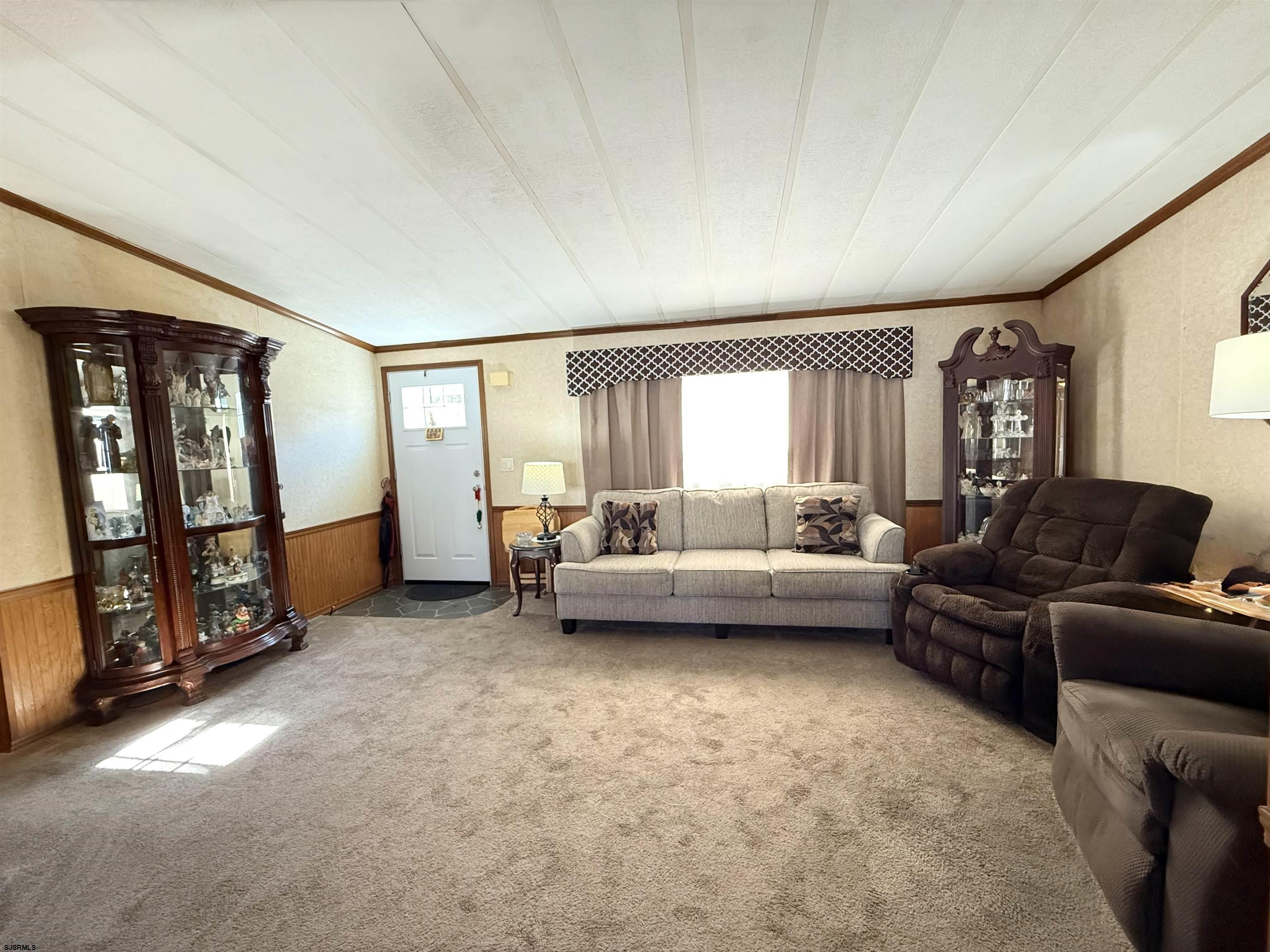 443 Priscilla Lane Buena, NJ 08310 - Photo 3 of 37 a living room with furniture and a flat screen tv