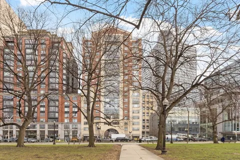 a view of a building with a yard