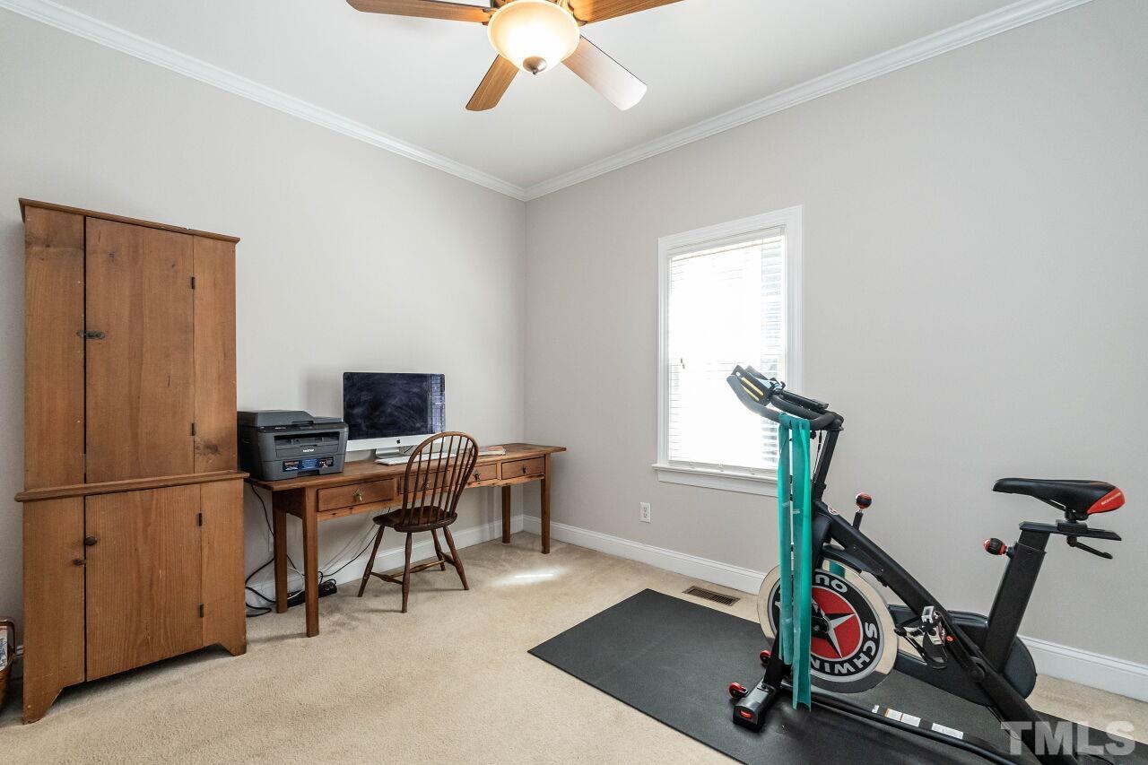 3129 Eton Road Raleigh, NC 27608 - Photo 26 of 44 a view of a workspace with furniture and a window