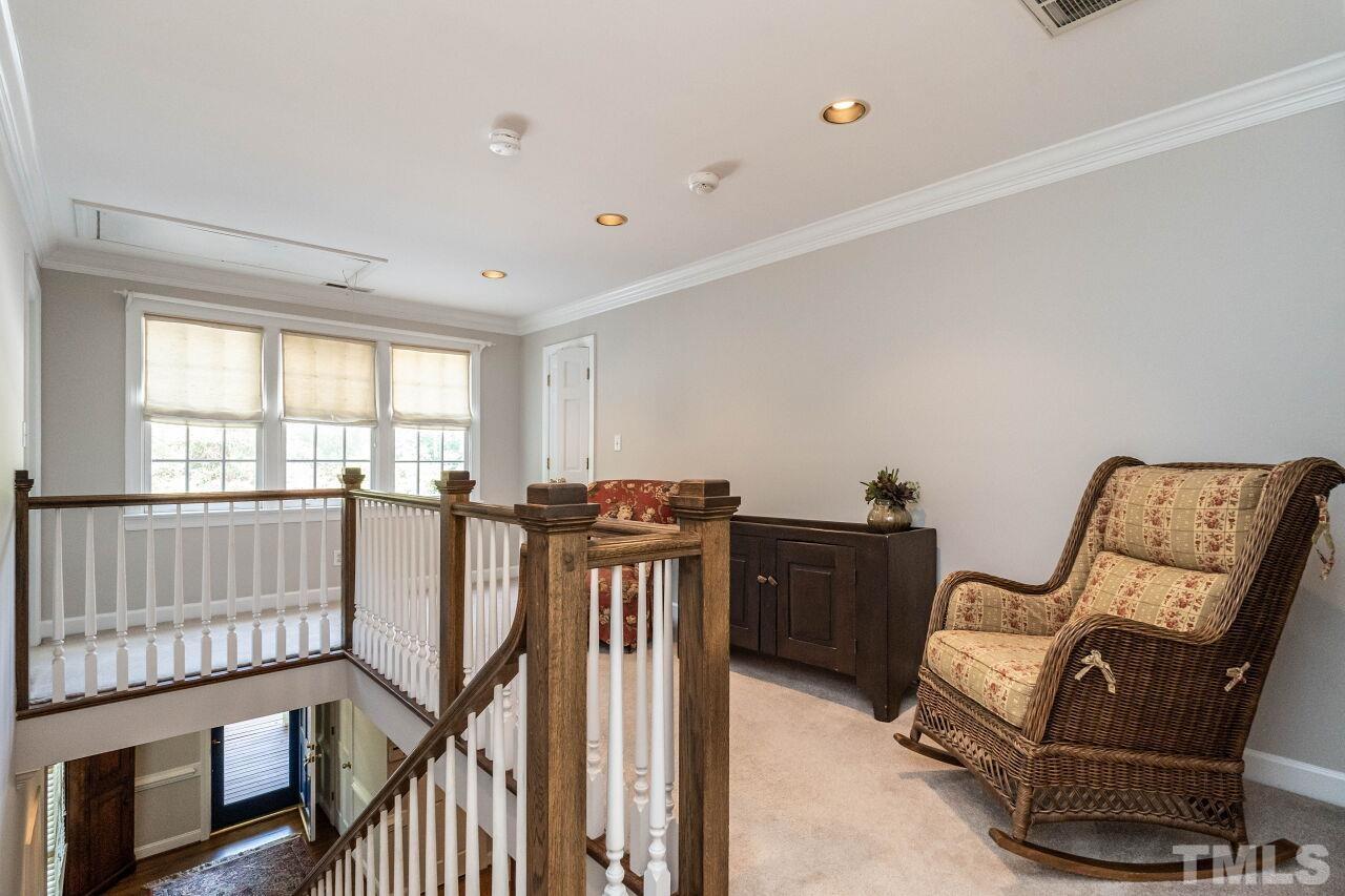 3129 Eton Road Raleigh, NC 27608 - Photo 28 of 44 a view of a hallway with workspace