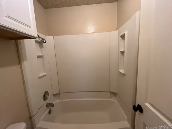 a bathroom with a bathtub