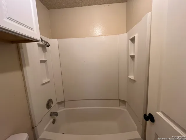 a bathroom with a bathtub