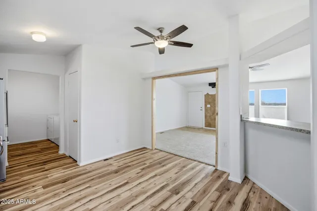a kitchen with stainless steel appliances granite countertop a stove and a sink
