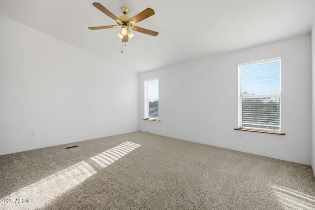 a view of bathroom with dual sinks