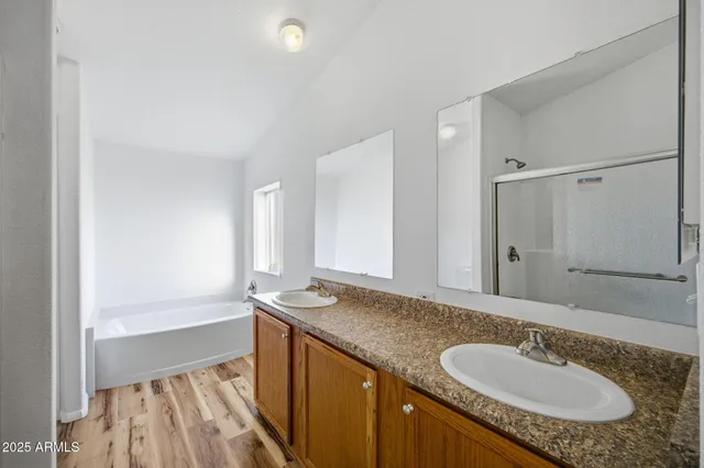 a view of a livingroom with a ceiling fan and window
