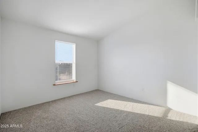 a bathroom with a sink mirror toilet and shower