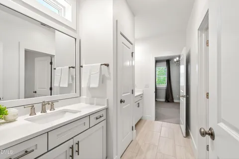 an empty room with wooden floor & closet