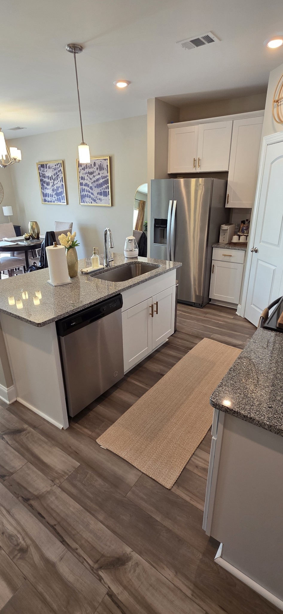 751 Prairie View Drive Columbia, TN 38401 - Photo 6 of 34 a large kitchen with kitchen island a large counter top space a sink stainless steel appliances and cabinets