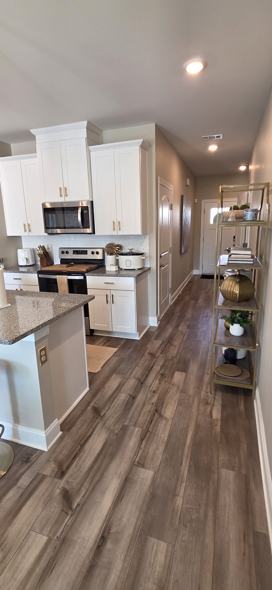 751 Prairie View Drive Columbia, TN 38401 - Photo 7 of 34 a large white kitchen with lots of counter top space a sink and appliances