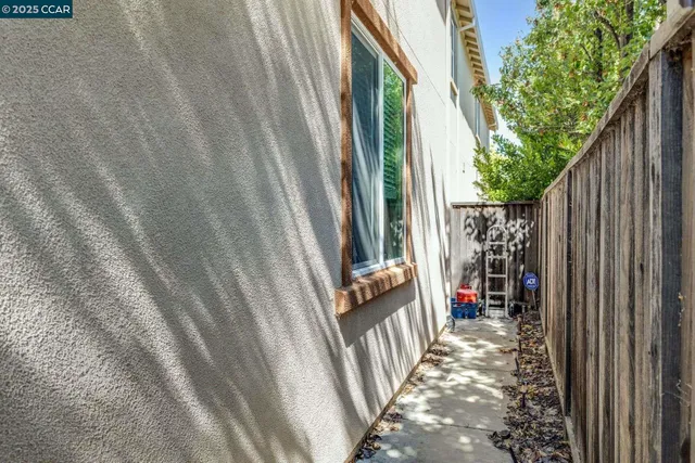 a view of a porch with wooden floor and stairs