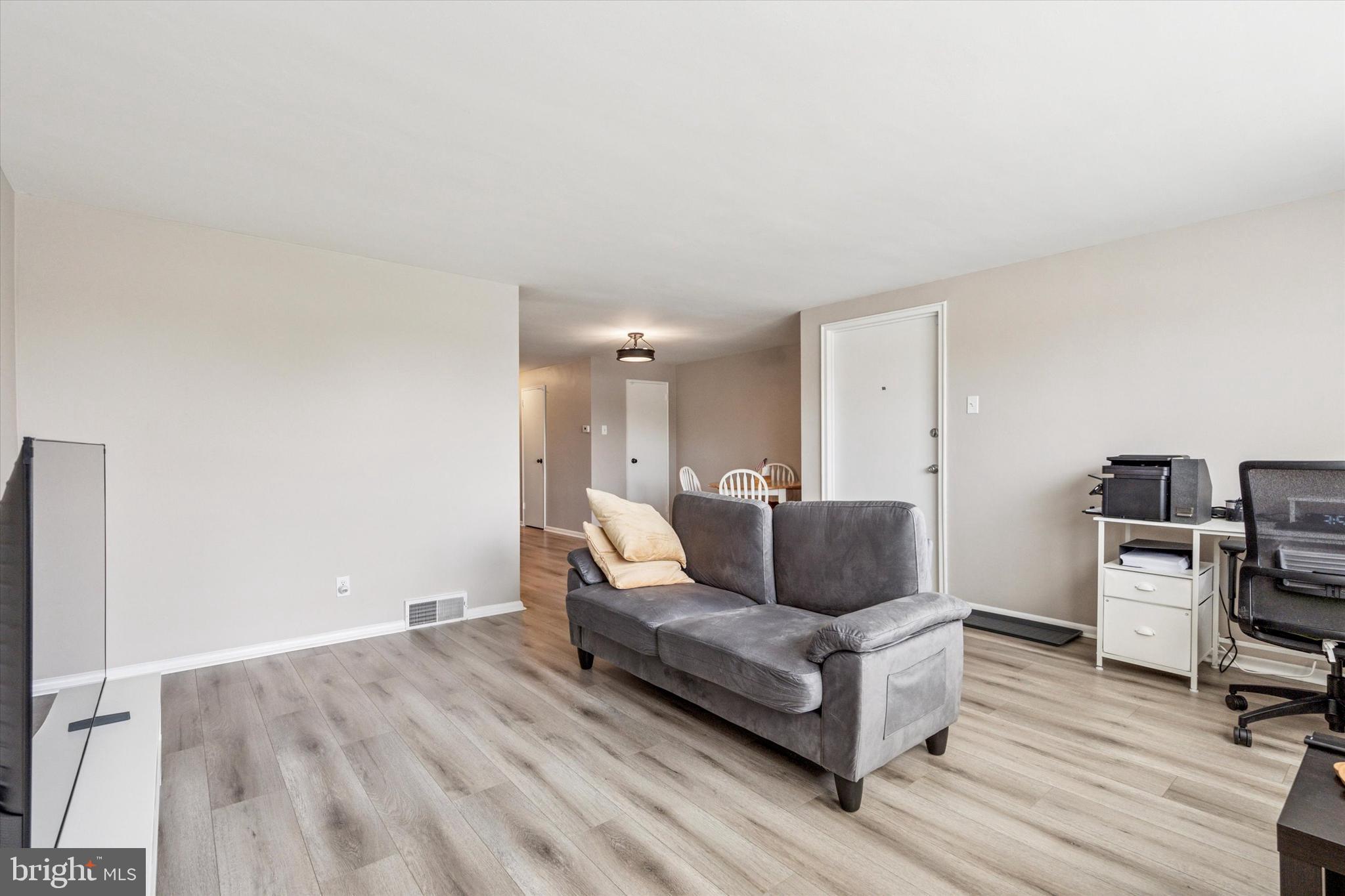 120 Clement Road Oreland, PA 19075 - Photo 15 of 34 a living room with furniture and a wooden floor