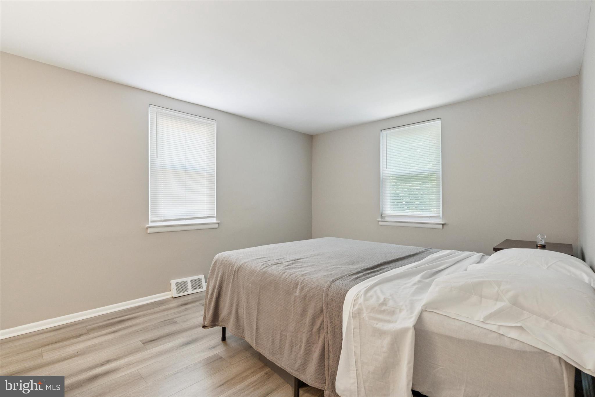 120 Clement Road Oreland, PA 19075 - Photo 20 of 34 a bedroom with a bed and a window