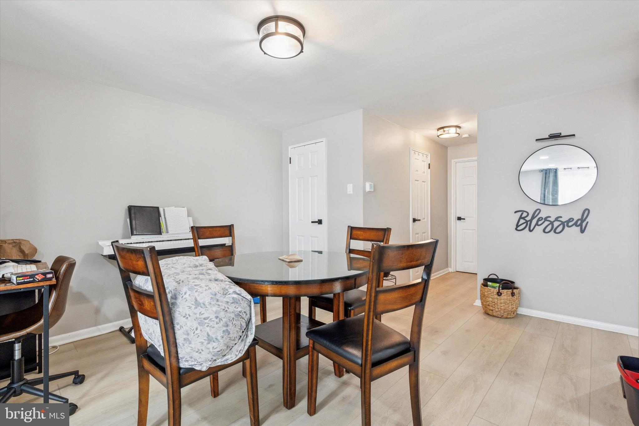 120 Clement Road Oreland, PA 19075 - Photo 24 of 34 a view of a dining room with furniture and wooden floor
