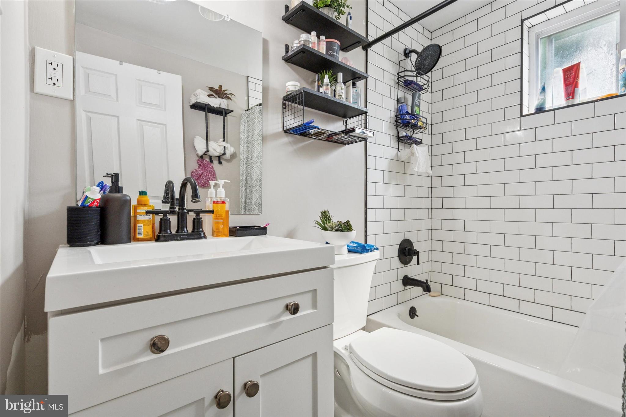 120 Clement Road Oreland, PA 19075 - Photo 26 of 34 a bathroom with a sink a toilet and shower