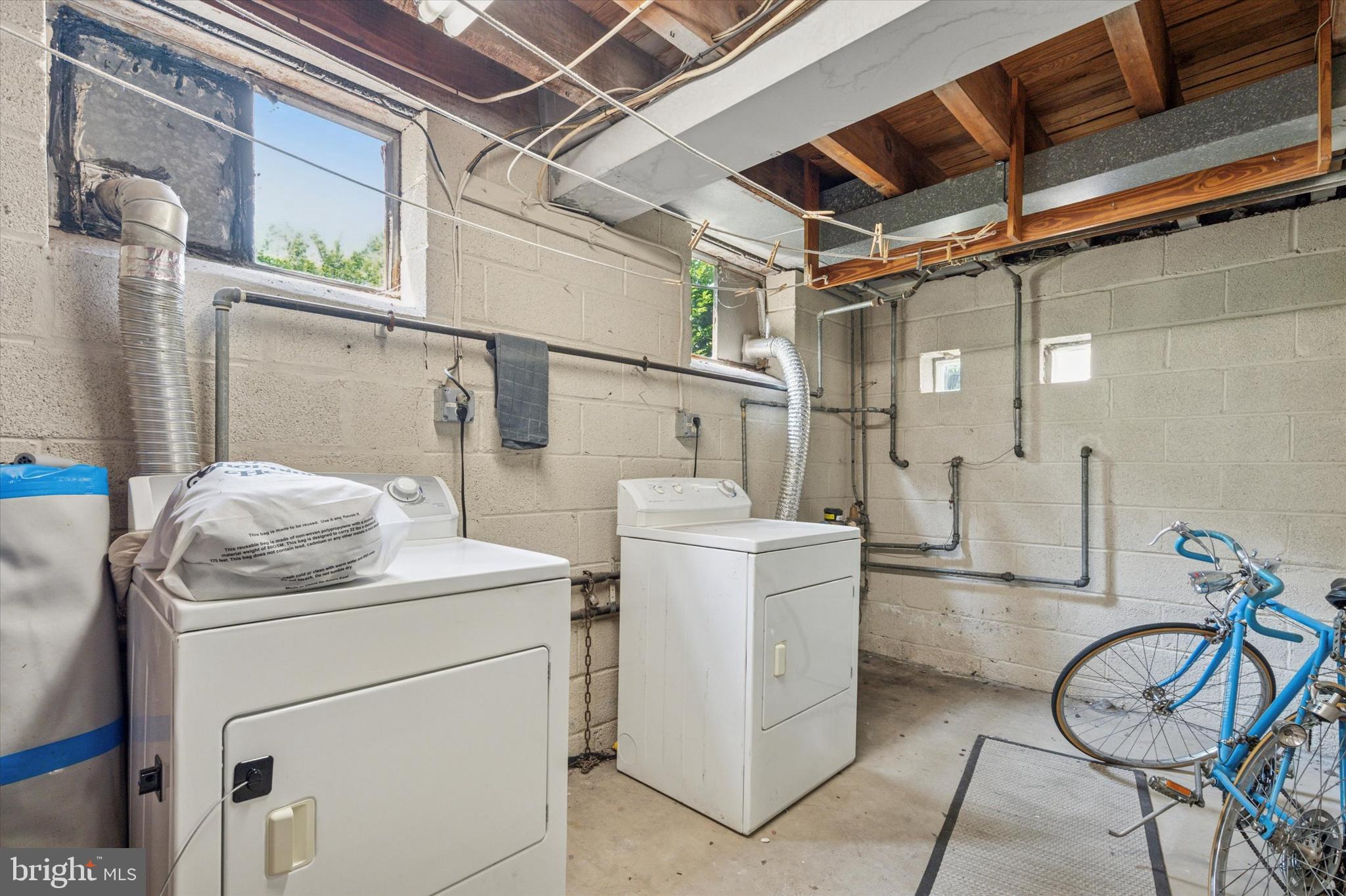 120 Clement Road Oreland, PA 19075 - Photo 27 of 34 a utility room with dryer and washer