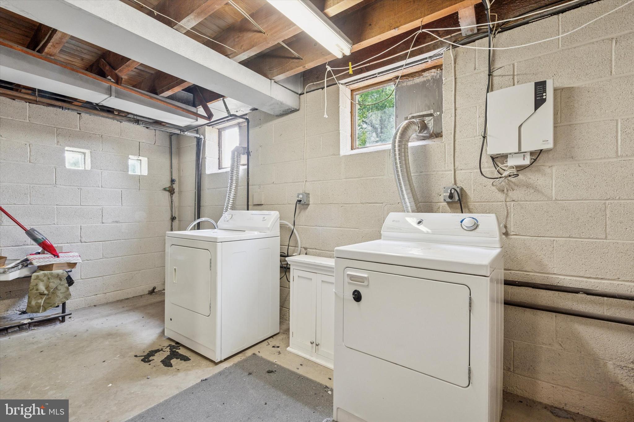 120 Clement Road Oreland, PA 19075 - Photo 28 of 34 a utility room with dryer and washer