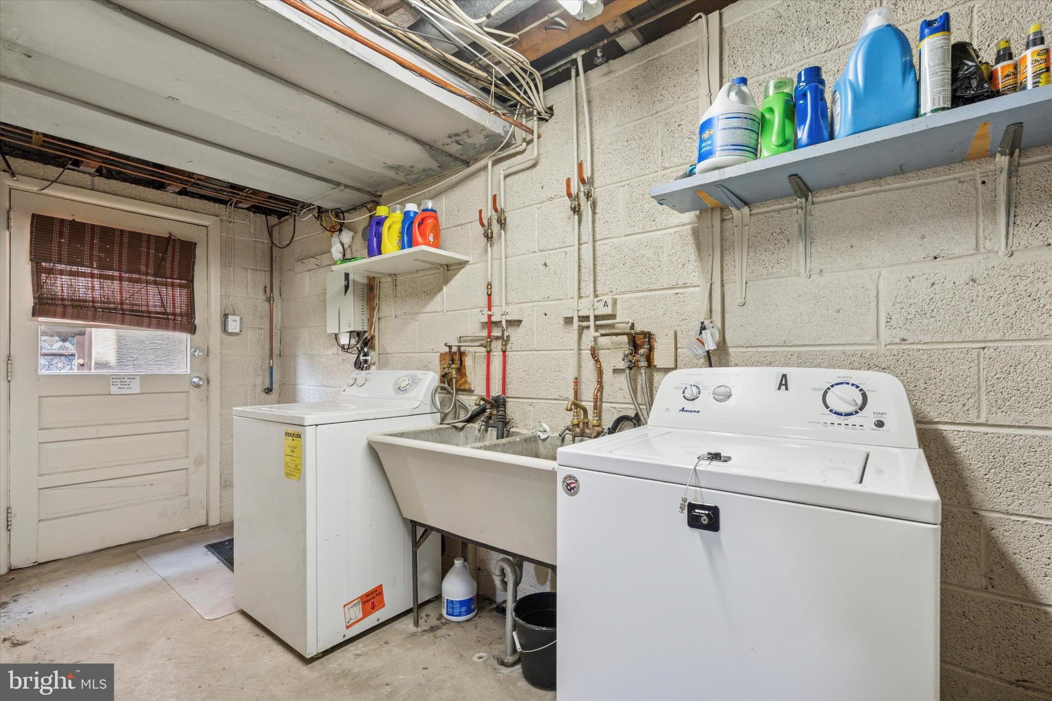 120 Clement Road Oreland, PA 19075 - Photo 29 of 34 a utility room with dryer and washer