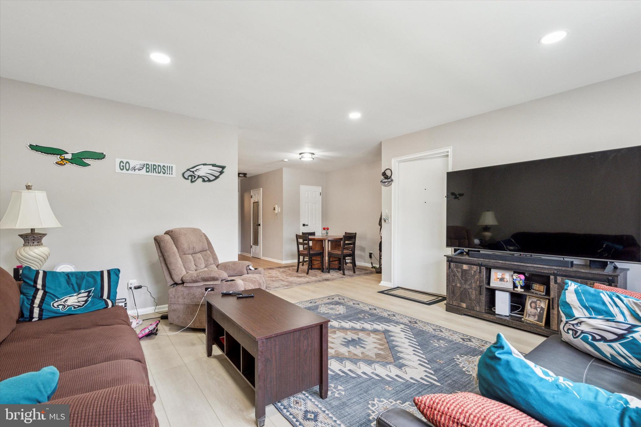120 Clement Road Oreland, PA 19075 - Photo 3 of 34 a living room with furniture and a flat screen tv