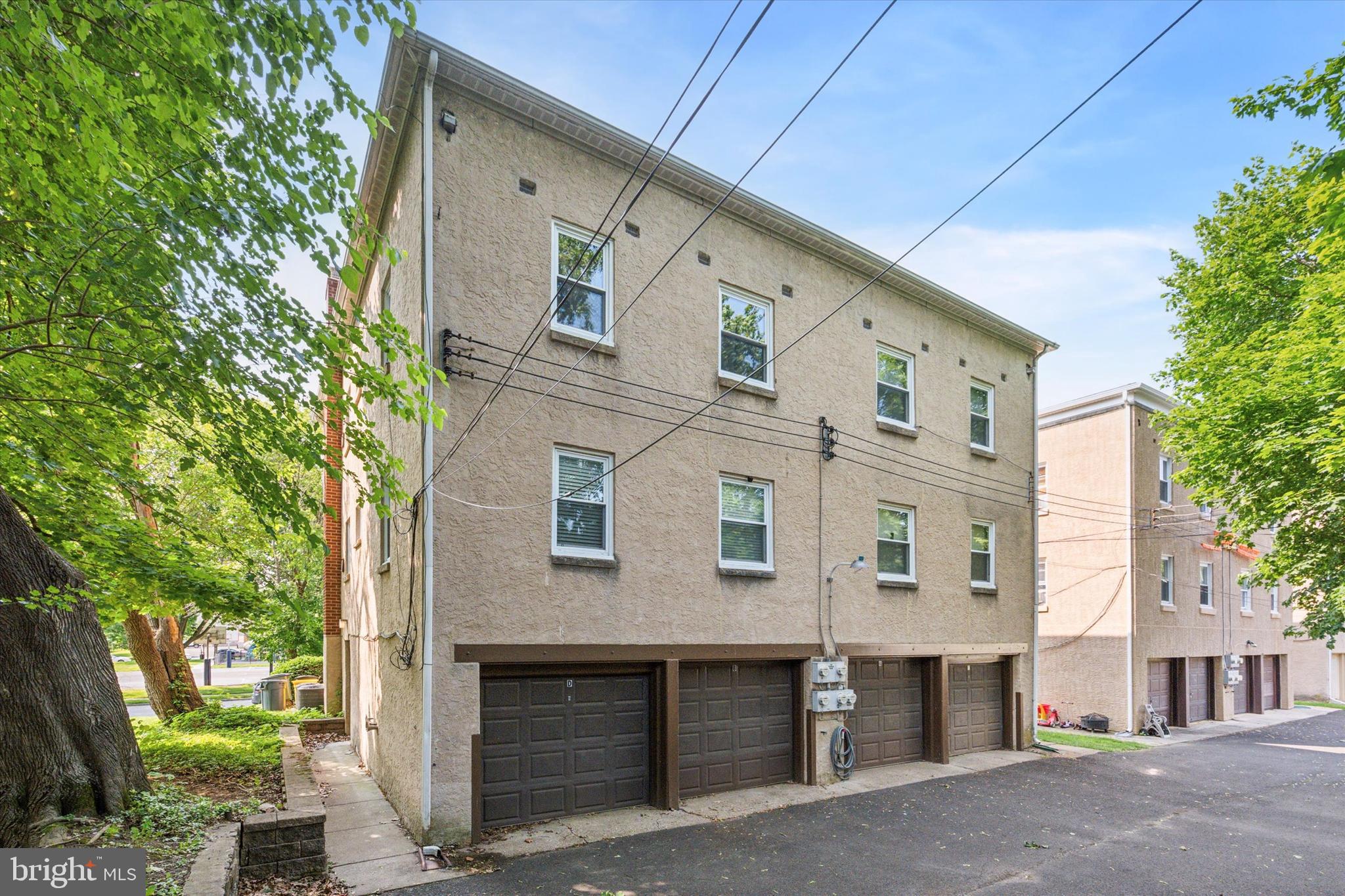 120 Clement Road Oreland, PA 19075 - Photo 34 of 34 a front view of a building with entryway