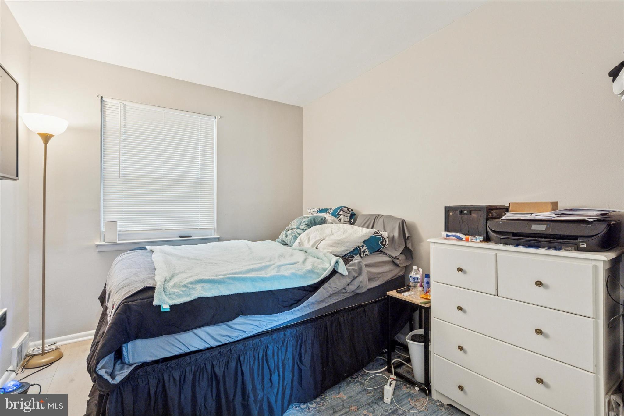 120 Clement Road Oreland, PA 19075 - Photo 7 of 34 a bedroom with a bed and a closet