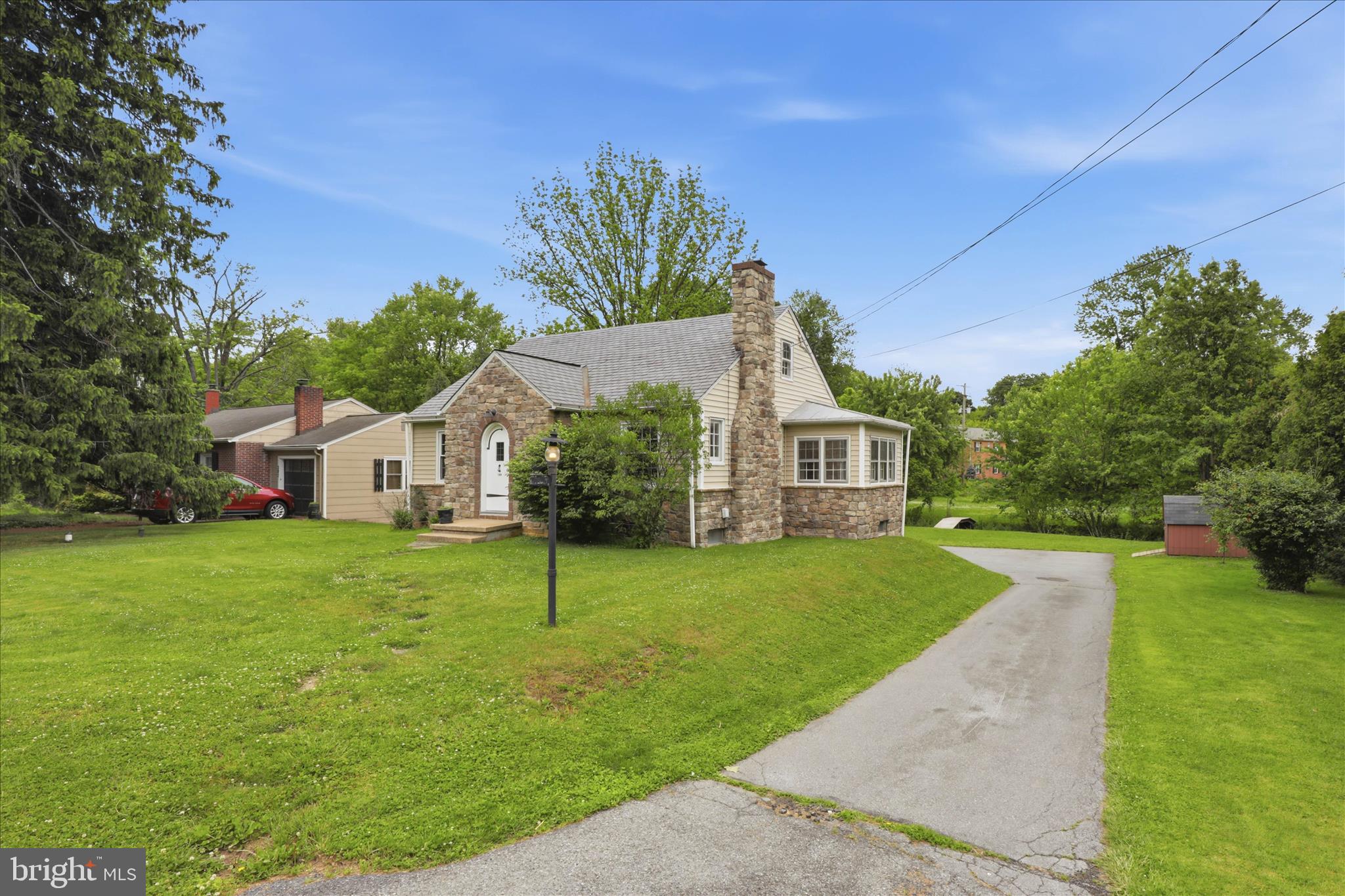 169 School House Road Lancaster, PA 17603 - Photo 2 of 39 a front view of a house with a yard and garage