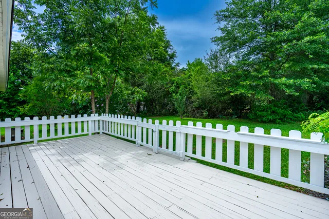 a view of a wooden fence