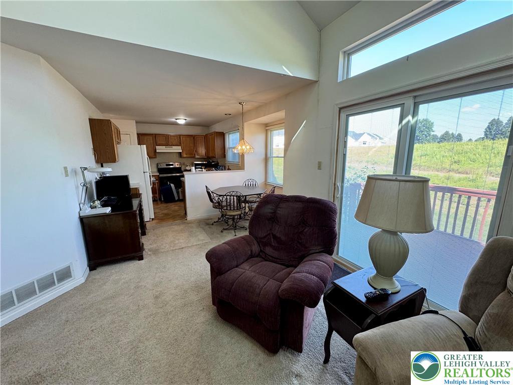 255 Ridings Circle Macungie, PA 18062 - Photo 12 of 30 a living room with furniture and a large window