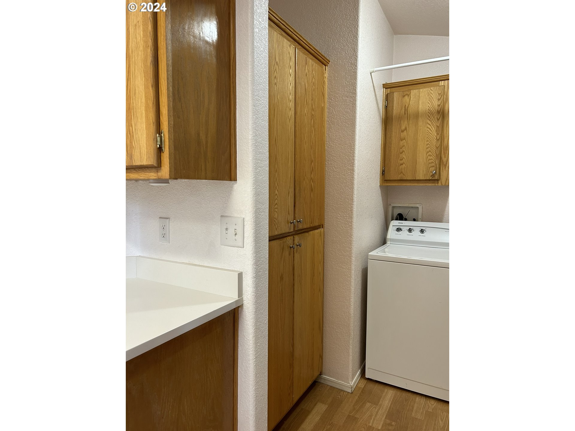853 Munsel Creek Loop Florence, OR 97439 - Photo 14 of 44 a bathroom with a sink and a mirror
