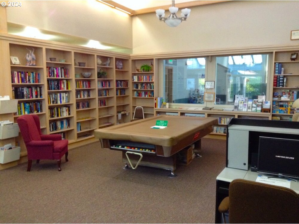 853 Munsel Creek Loop Florence, OR 97439 - Photo 43 of 44 a room with furniture pool table and a large window