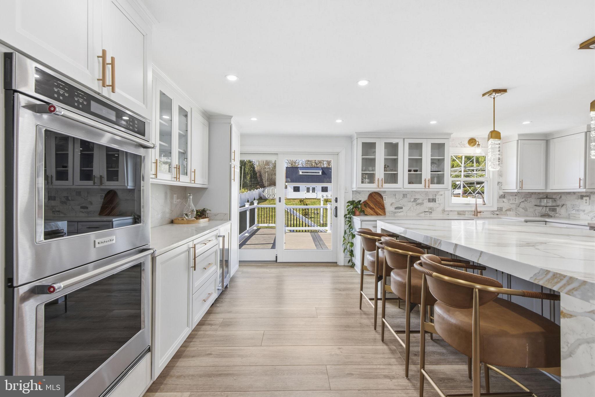 1 Highview Road Conowingo, MD 21918 - Photo 13 of 54 a large kitchen with stainless steel appliances granite countertop a stove and a sink