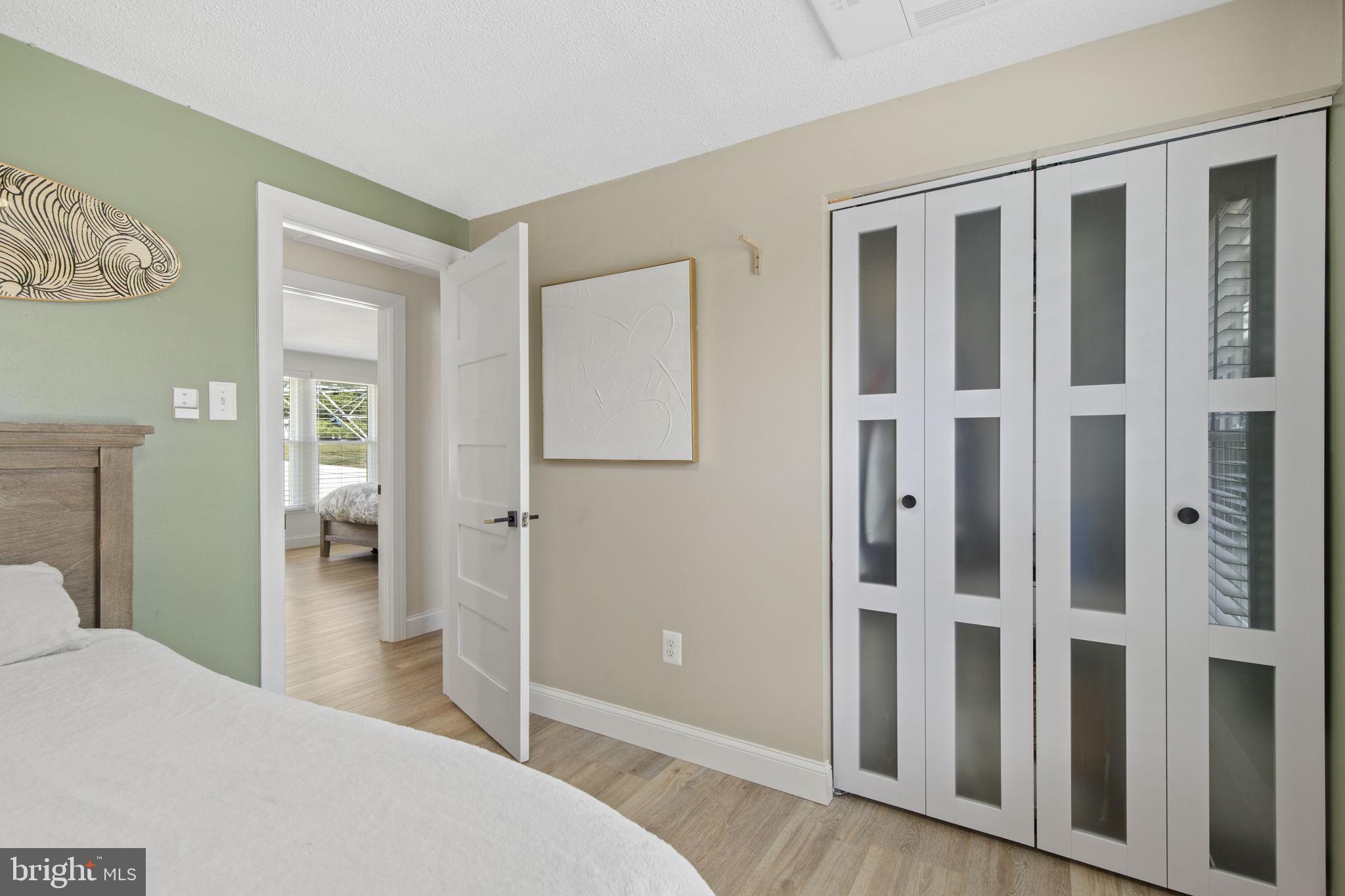 1 Highview Road Conowingo, MD 21918 - Photo 19 of 54 a bedroom with a bed and a large mirror