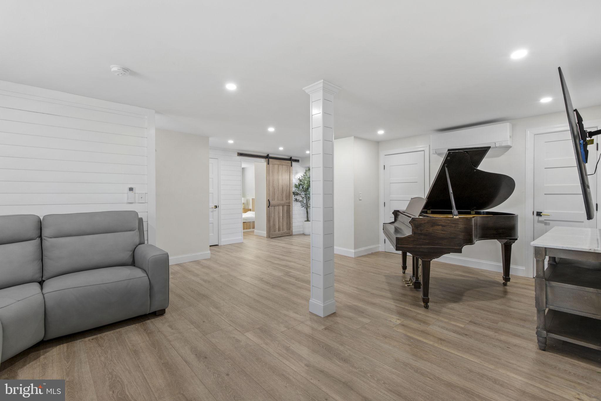 1 Highview Road Conowingo, MD 21918 - Photo 26 of 54 a living room with furniture and a wooden floor