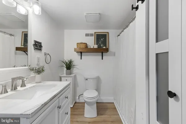 a view of a hallway with washer and dryer