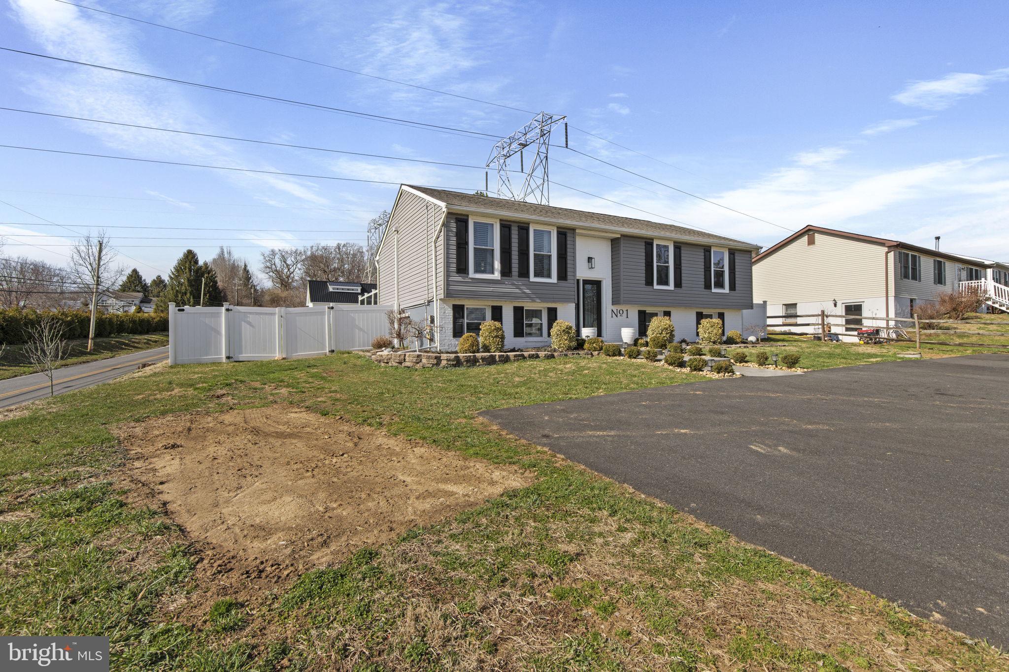 1 Highview Road Conowingo, MD 21918 - Photo 41 of 54 a front view of a house with a yard