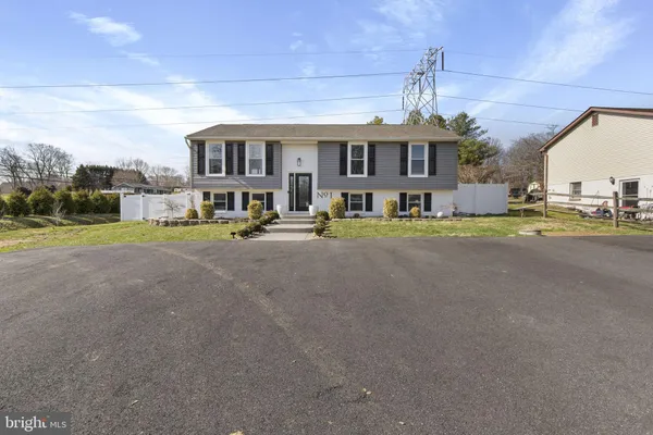 a picture of a room with a white wall and a white wall