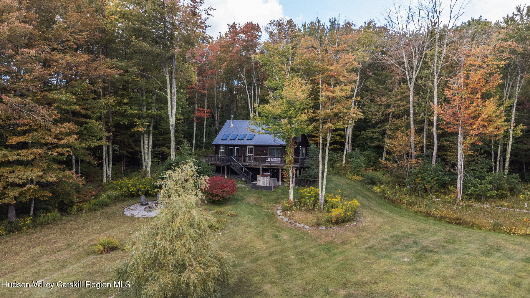 a view of backyard with green space