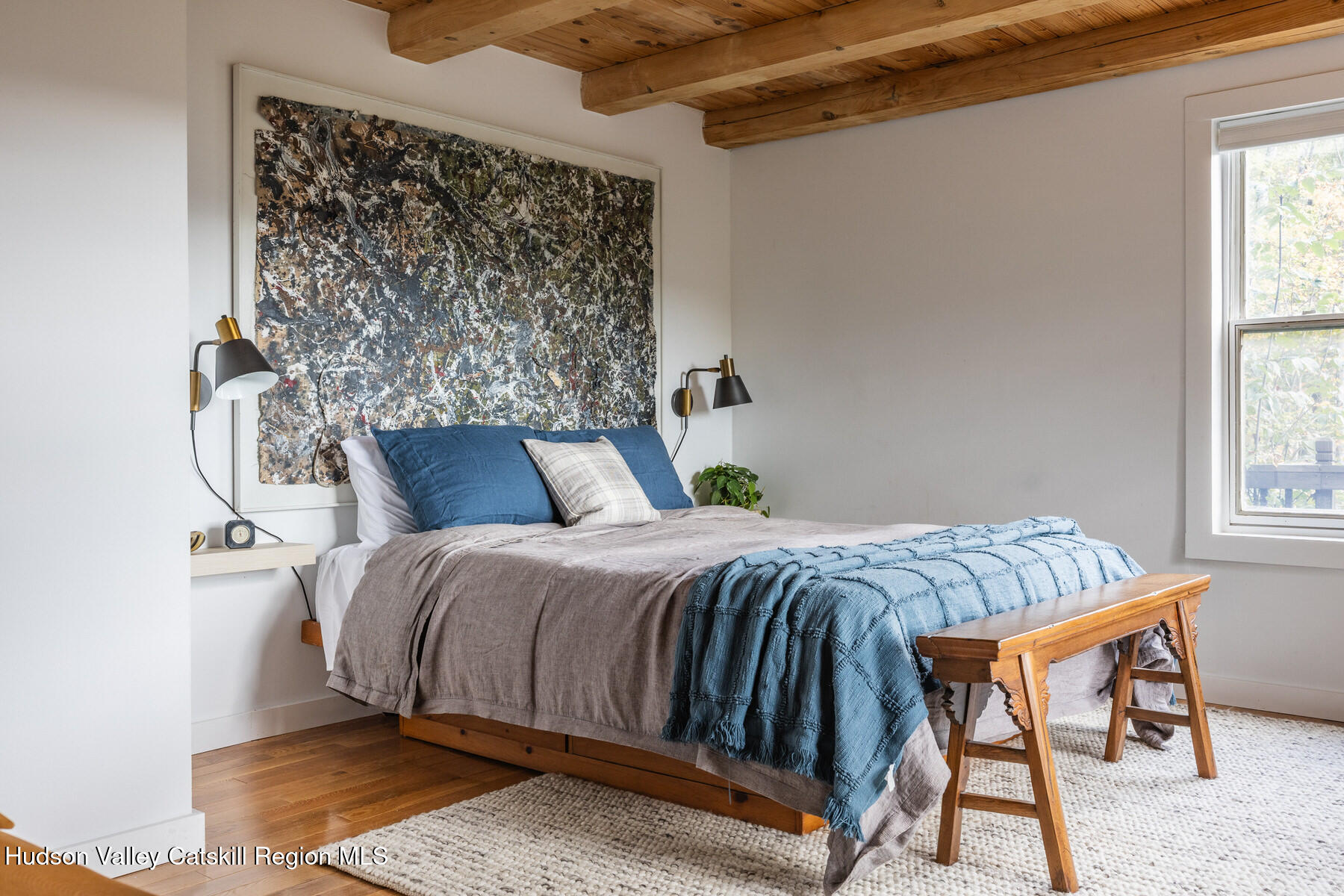 209 Alder Pond Road Andes, NY 13731 - Photo 11 of 32 a bed sitting in a bedroom next to a window