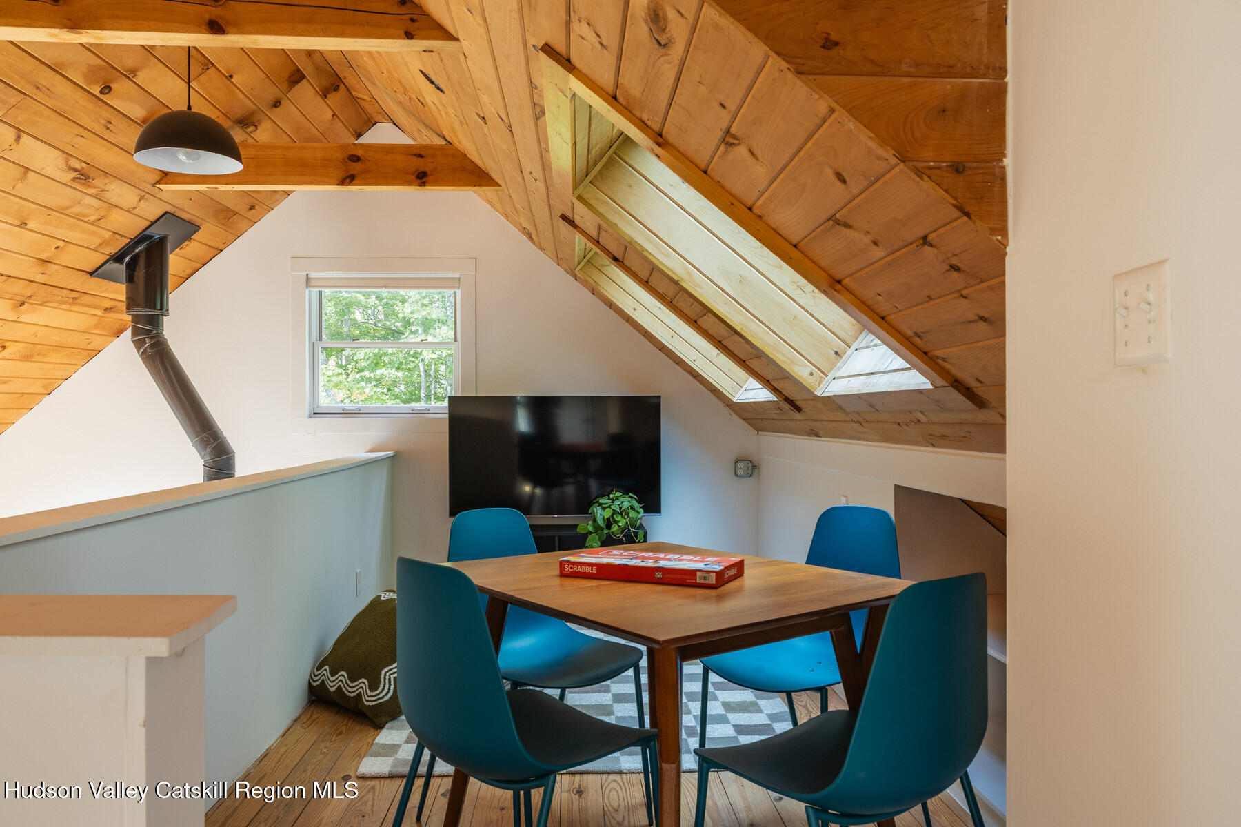 209 Alder Pond Road Andes, NY 13731 - Photo 17 of 32 a backyard of a house with table and chairs