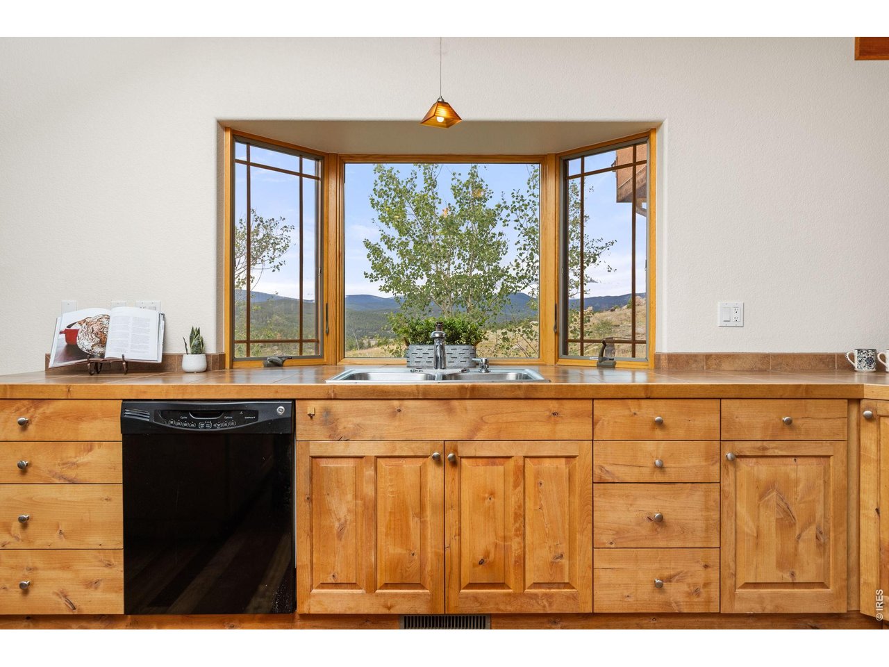 2607 Ridge Road Nederland, CO 80466 - Photo 16 of 50 Custom hand-crafted cherry cabinetry