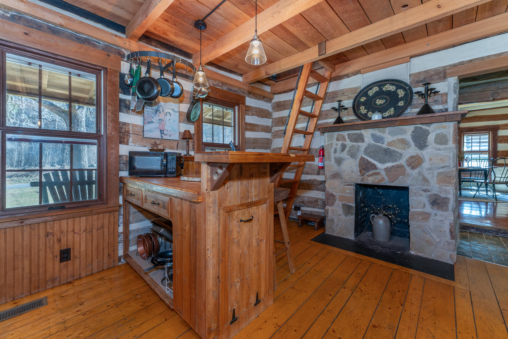 6102 Jennings Creek Road Buchanan, VA 24066 - Photo 28 of 79 a view of a livingroom with wooden floor and a fireplace