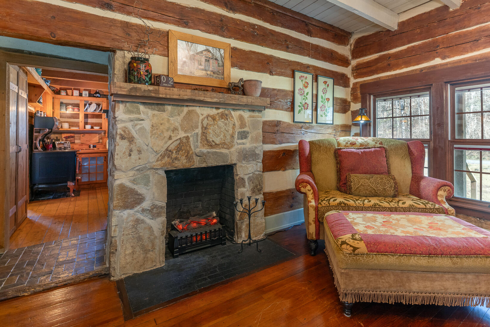 6102 Jennings Creek Road Buchanan, VA 24066 - Photo 33 of 79 a bedroom with furniture and a fireplace