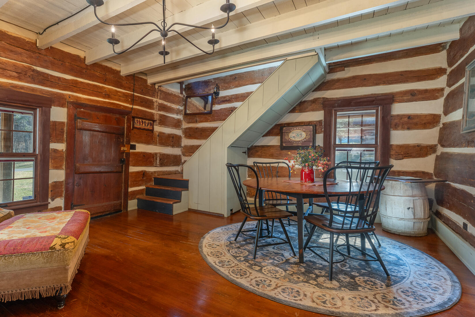 6102 Jennings Creek Road Buchanan, VA 24066 - Photo 36 of 79 a dining room with furniture a rug and wooden floor